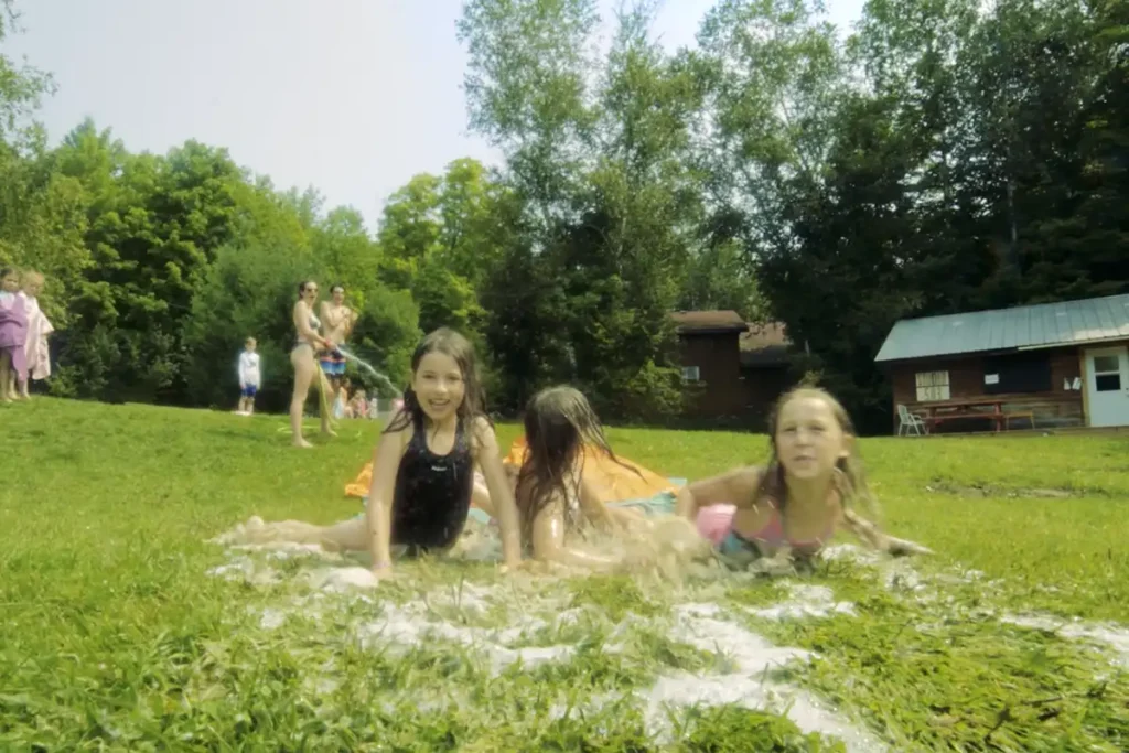 slip and slides at can aqua summer camp