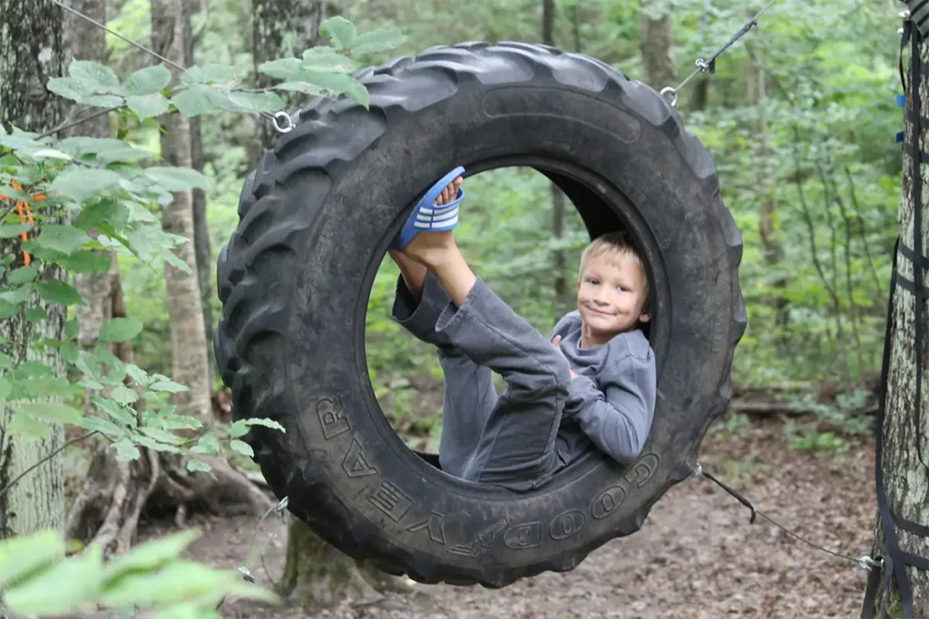 tire swings at can aqua summer camp